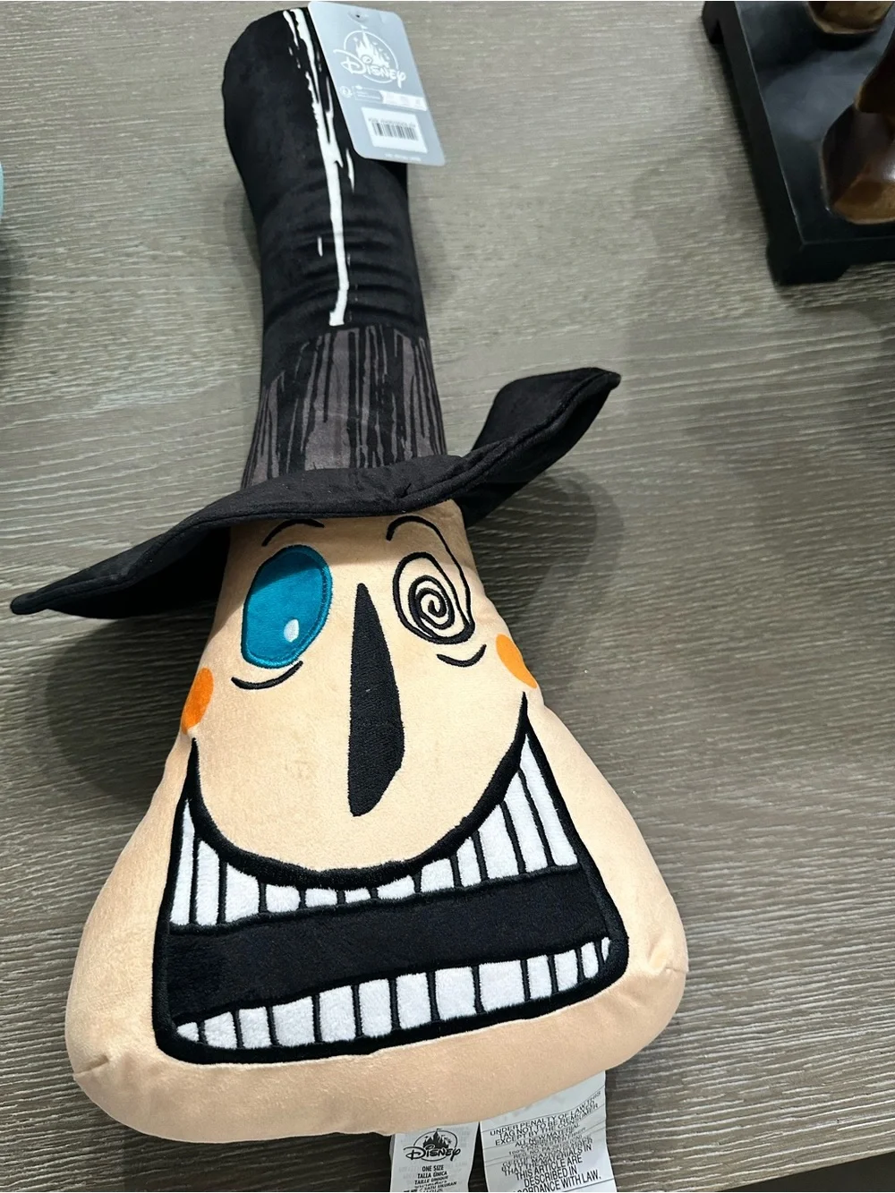 The mayor plush pillow from Disney parks.